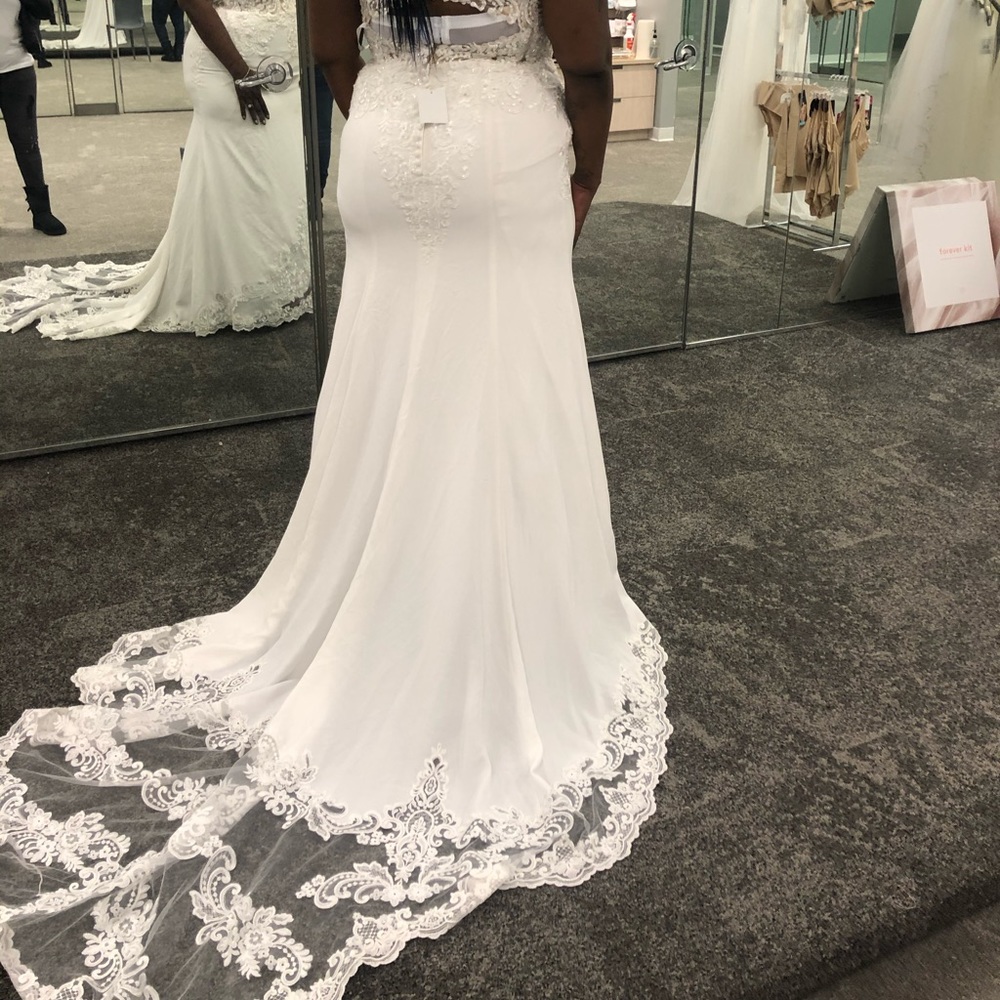 Never worn still in David bridal bag with original tag